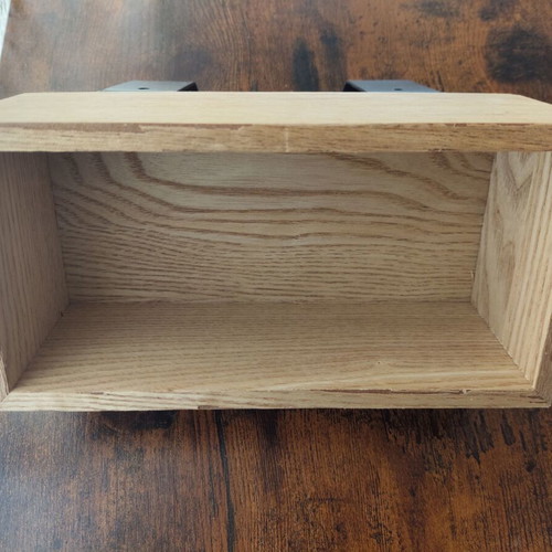 Wall hanger used with storage space