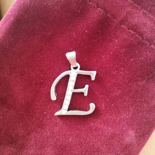 Monogram E jewelry used, silver with zircon, brass