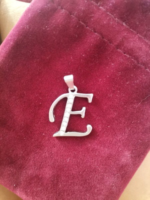 Monogram E jewelry used, silver with zircon, brass