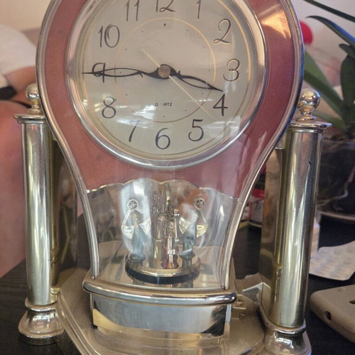 Quartz decorative table clock used with rotating Christmas scene