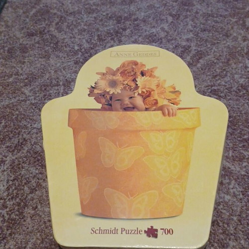 Anne Geddes puzzle 700 pieces used, baby in flowerpot