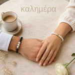 Handmade bracelet with cream glass pearls 14mm elastic and gold element ZJ-002