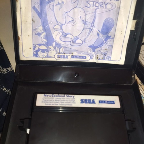 Master System games 9 with 10 cases, unknown condition