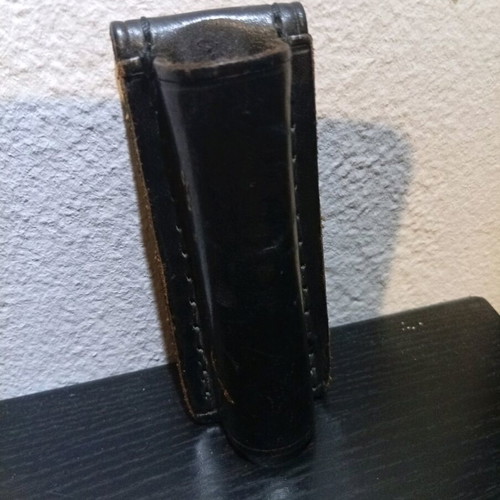 Mini Maglite flashlight belt holster used, leather