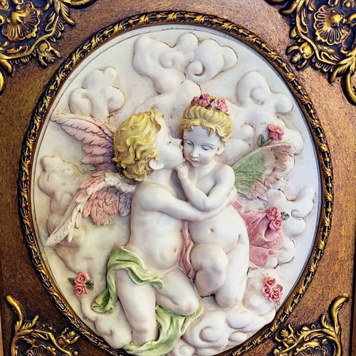 Relief wall art used in ornate frame 56x50cm