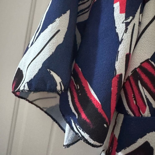 Blue floral top like new, backless with ties