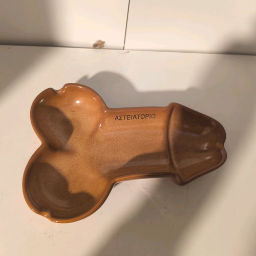 Ashtray with funny shape like new