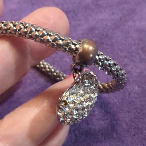 Elastic bracelet used with decorative silver heart charm