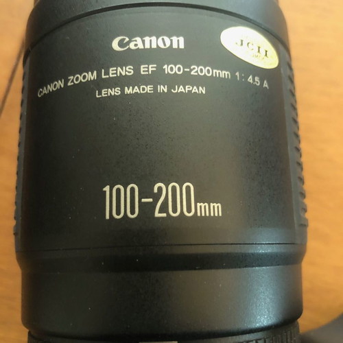 Canon EOS 750 analog camera used with Canon EF 100-200 mm 1:45 A lens and case