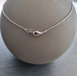 Necklace with hanging chain and stones