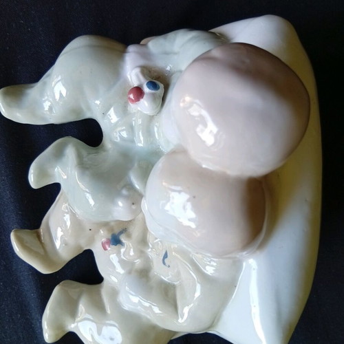 Porcelain figurine of twin babies like new