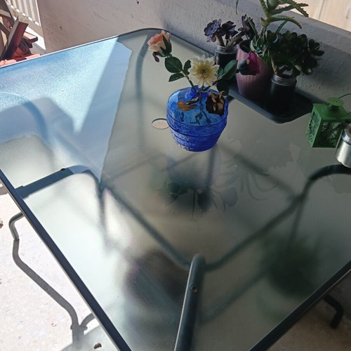 Veranda table with screw covers