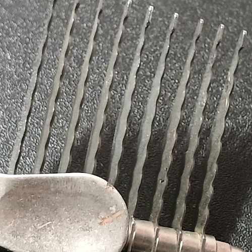 Dog comb with razor used for hair removal
