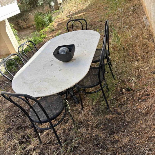 Garden table with marble and 6 metal chairs used