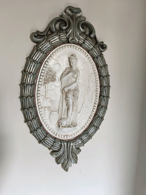 Neoclassical large plaster wall decoration with embossed figure like new