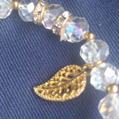 Steel bracelet with crystals new, white and gold details