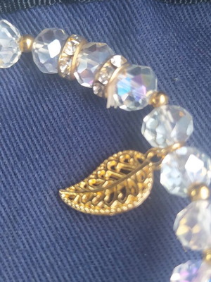Steel bracelet with crystals new, white and gold details