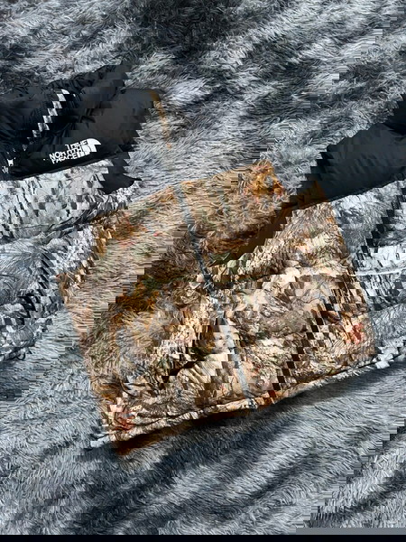 The North Face camo gilet