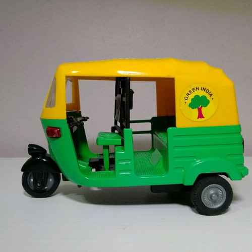 Toy ricksaw TUK TUK used, traditional Indian taxi