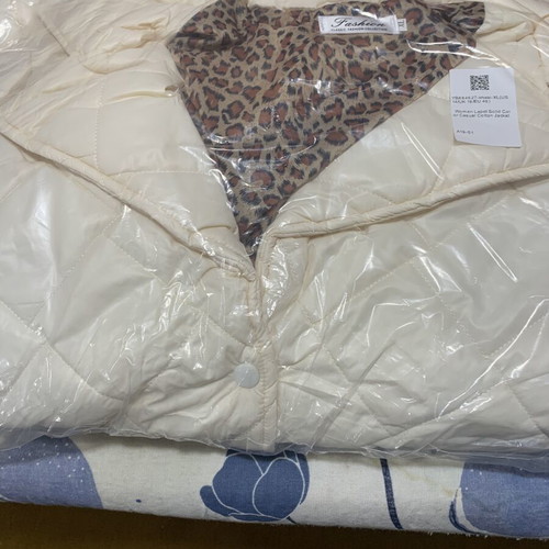 Long white quilted jacket with animal print lining new