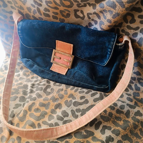 Denim handbag used with pink details