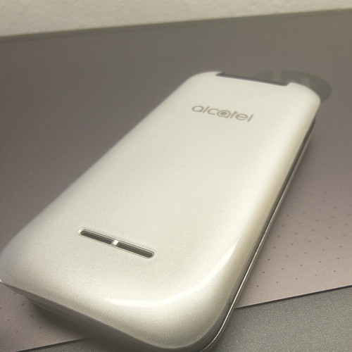 Alcatel mobile phone, silver, memory card slot