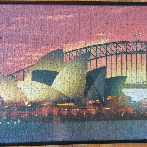 Framed puzzle like new, dimensions 0.53x0.73 m