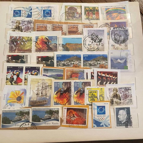 Stamp collection used with album, over 500 pieces