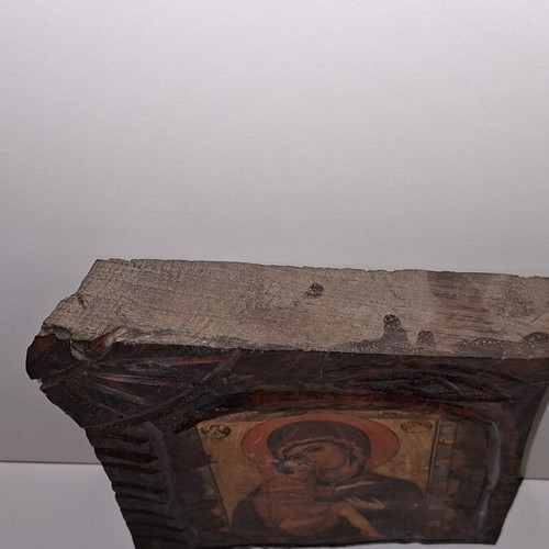 Panagia I Glykofilousa icon on wood used with carved decoration
