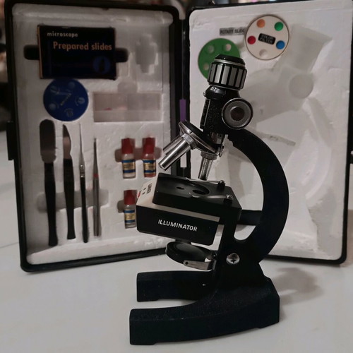Vintage metal microscope with case and accessories like new