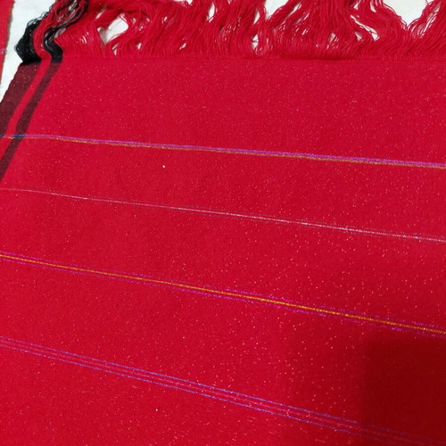 Traditional cotton fabric on loom, new, red with black stripes