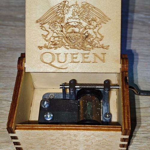 Wooden Queen Music Box like new with hand crank and engraved design