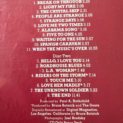 The Doors CDs used, one double and one single