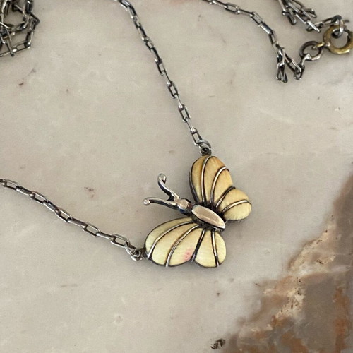 Silver butterfly necklace used vintage