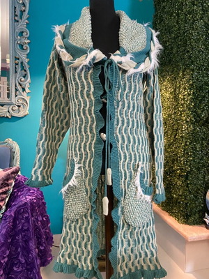 Long wool cardigan used with faux fur details in petrol and beige