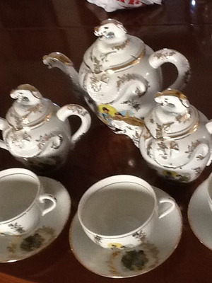 Porcelain vintage tea set with geisha design