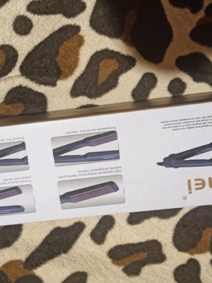 Keimi hair straightener new, sealed in box