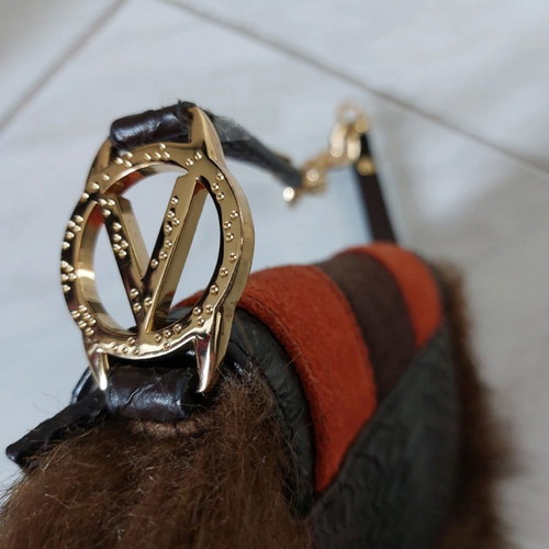 Handbag new with synthetic brown fur and croco print