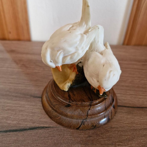 Figurine with doves on wooden base used