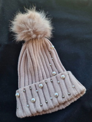 Pink knitted hat with pom pom and pearls like new