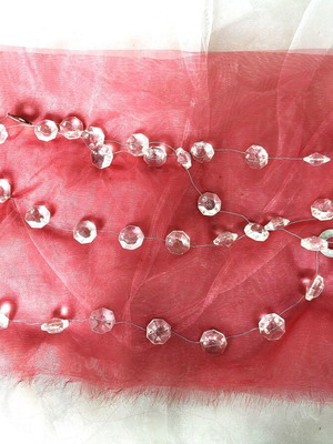 Decorative garland like new with transparent acrylic beads