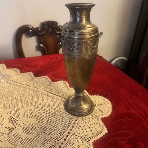 Large metal vase used, very old