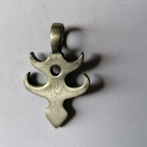Metal Fishbone Pendant new with tribal designs