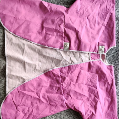 Babybjorn smock used for feeding or play pink fuchsia