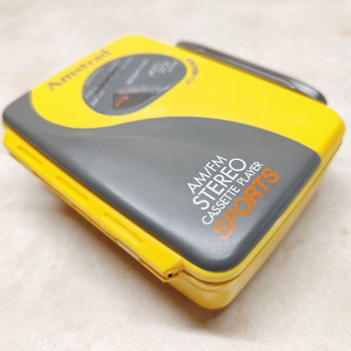 Amstrad All Weather Sports Vintage Walkman used, yellow cassette radio