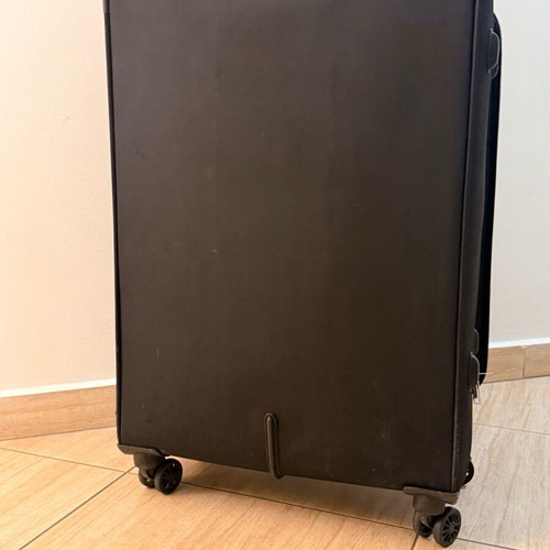 Large wheeled travel suitcase like new, black
