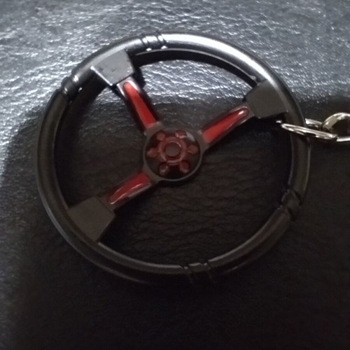 Metal car keychain new with sporting black red steering wheel design