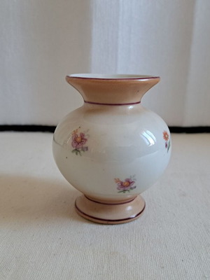 Retro miniature porcelain vase with floral motifs
