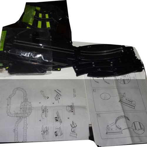 Slot car racing track used with 2 racing cars