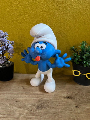 Smurf figure with tongue out new